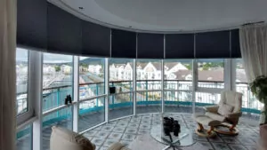 cellular curved blind in modern home in northern ireland living room seaside view on the north coast