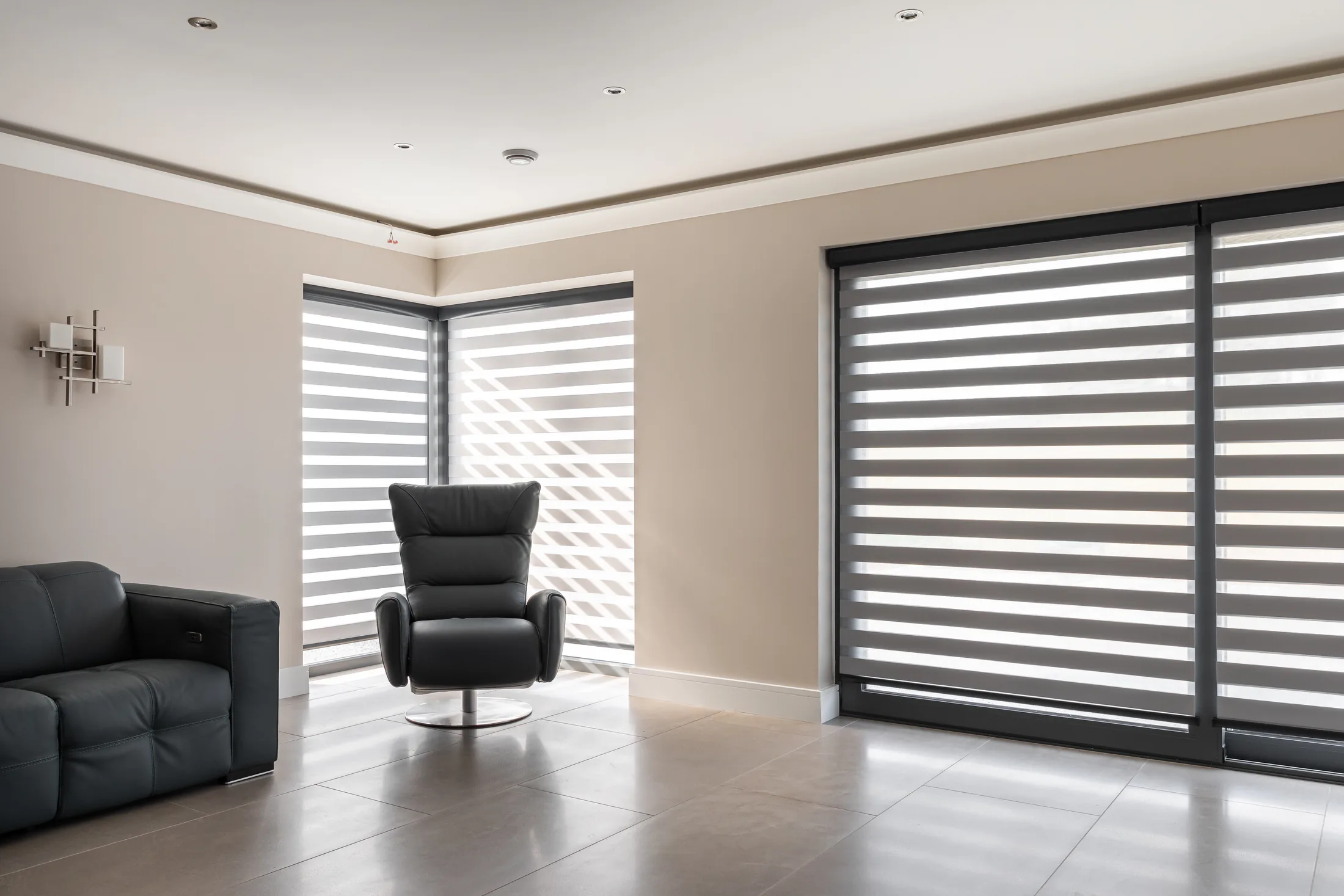Day and Night blinds from the Aura range fitted in a contemporary living room