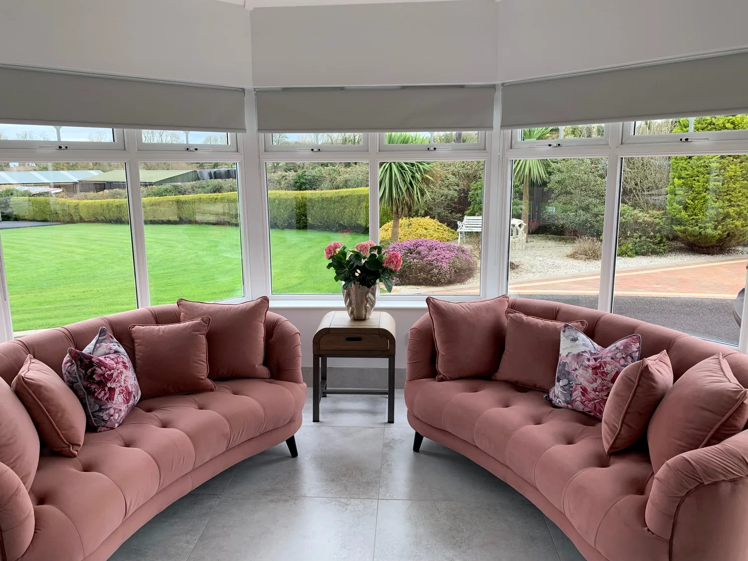 Light-filtering roller blinds in a contemporary lounge