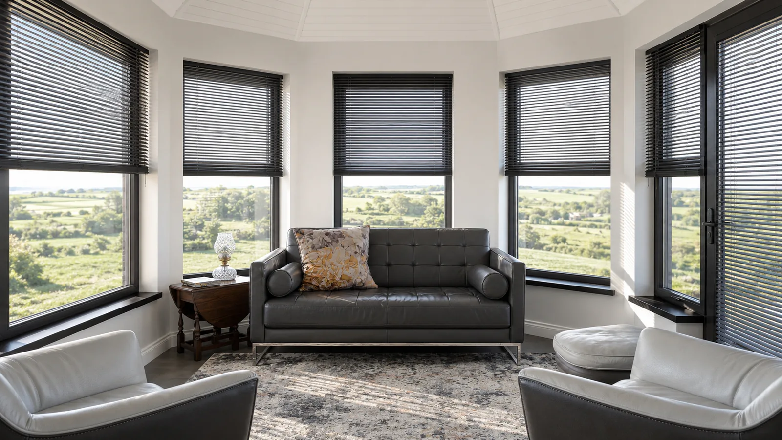 Dark Venetian blinds across a bright multi-window living room