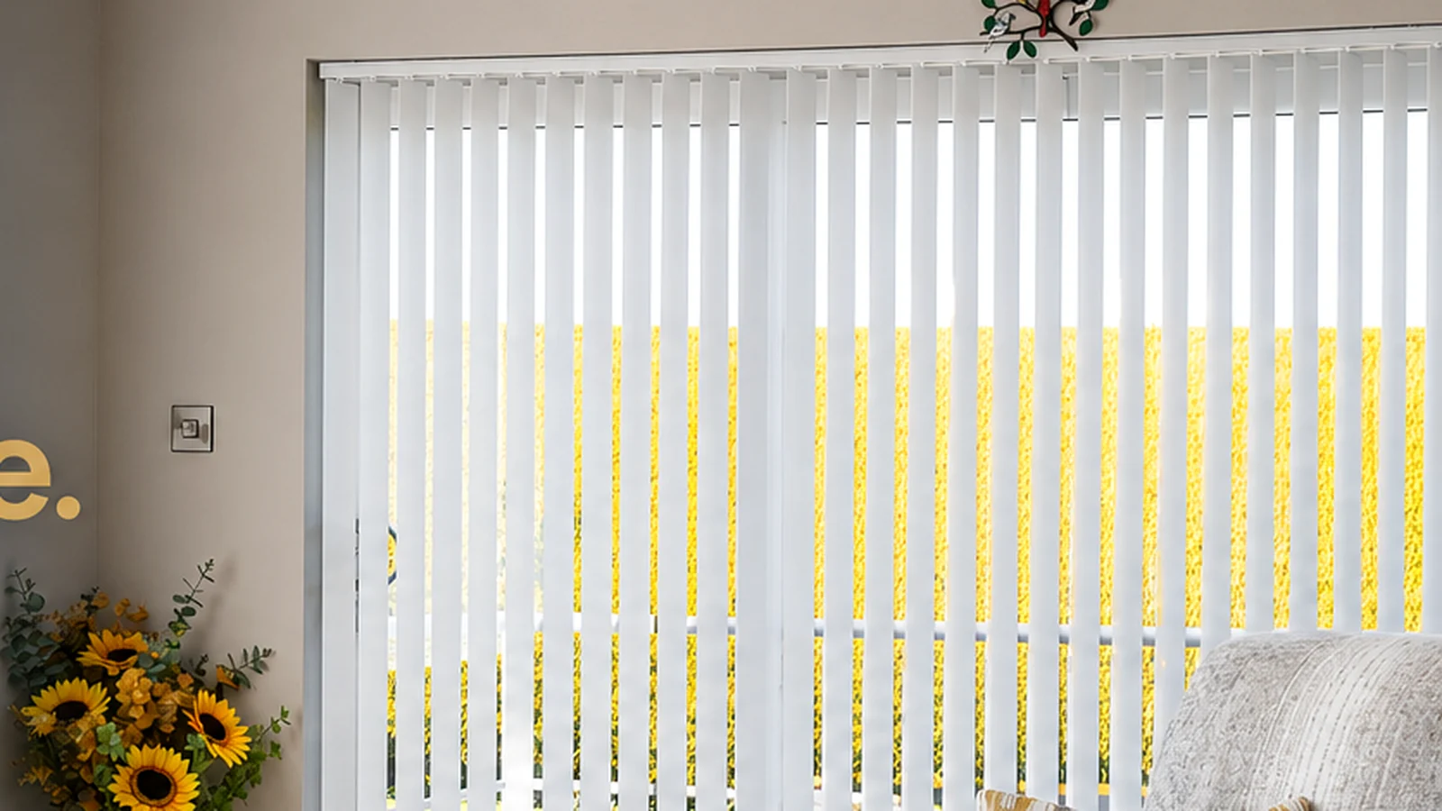 White made-to-measure Vertical blinds fitted across a wide glazed opening in a Northern Ireland living room
