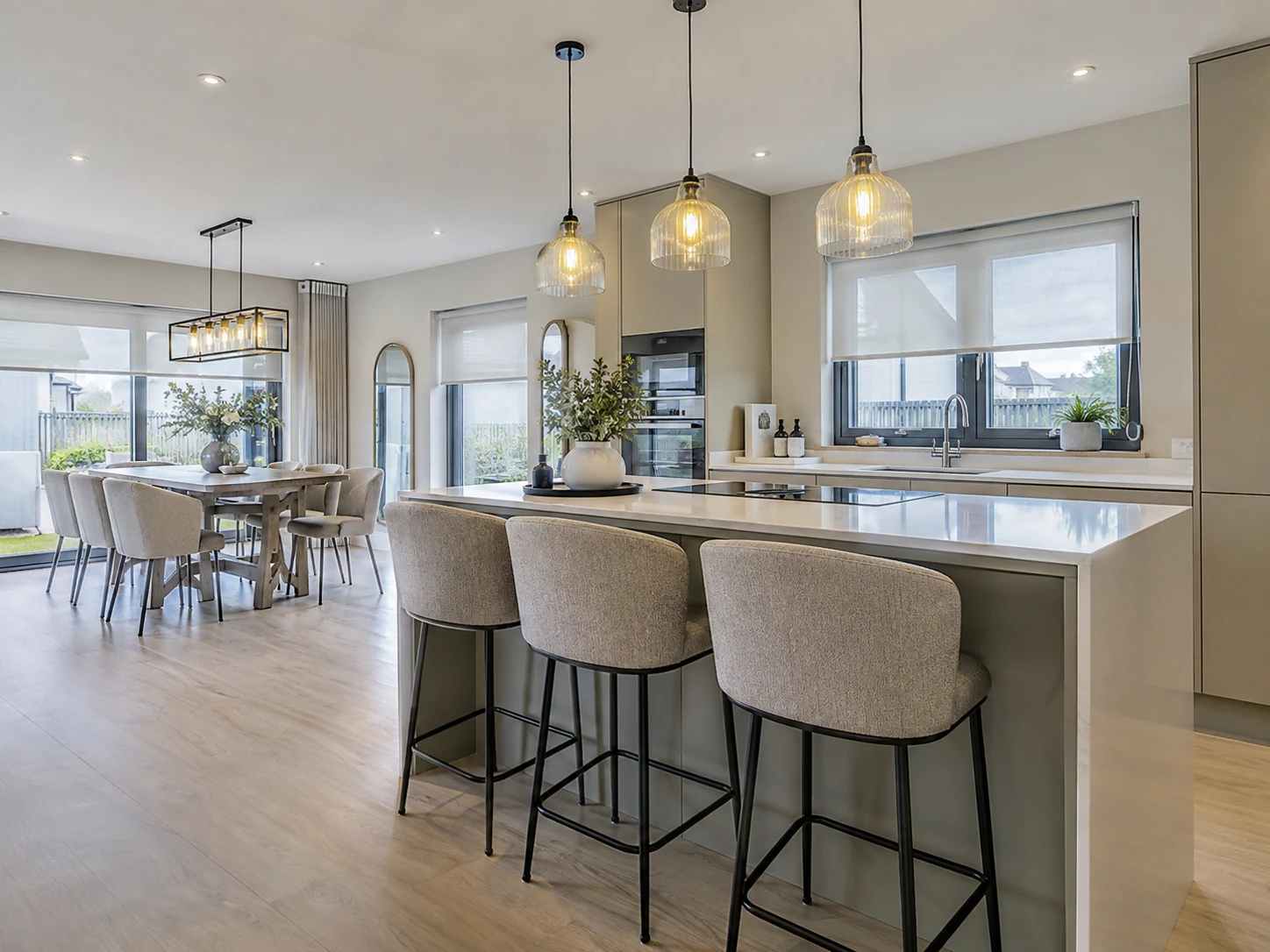 Merchants Mews Lisbane blinds and shutters – roller blinds in an open-plan kitchen and dining room