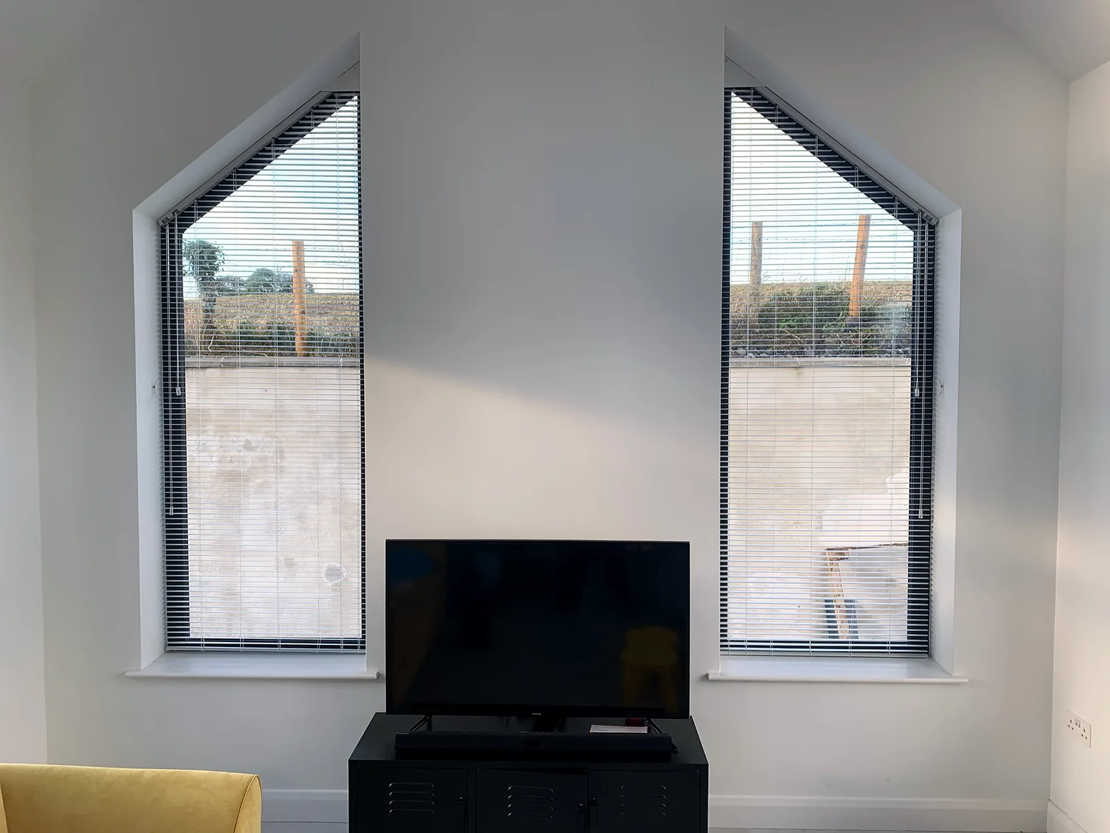 Specialist made-to-measure blinds fitted to unusual shaped glazing