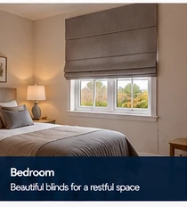 Illustrative bedroom at The Paddocks in Enniskillen with a tailored Roman blind and soft neutral styling.